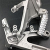 Aluminum alloy made replacement rider/front foot pegs and mount bracket kits for 2004-2007 Honda CBR1000RR, this style footrest assembly are light weight than OEM stock footrest and race-inspired design provides excellent traction and feedback. CNC machined from high-impact aluminum for durability and precise fitment.