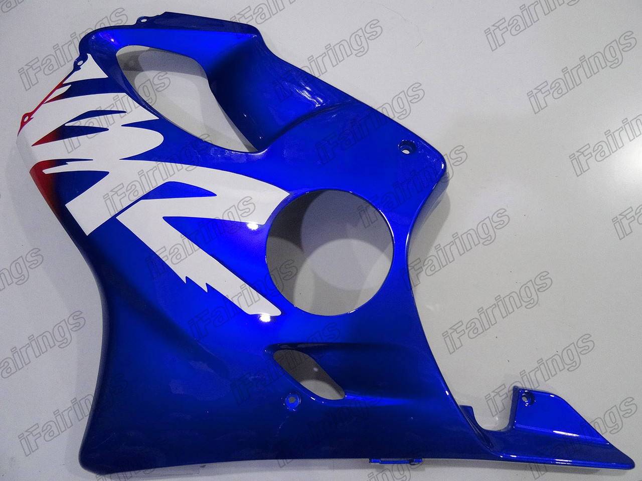 Aftermarket fairing for 1999 2000 Honda CBR600F4 red and blue livery.