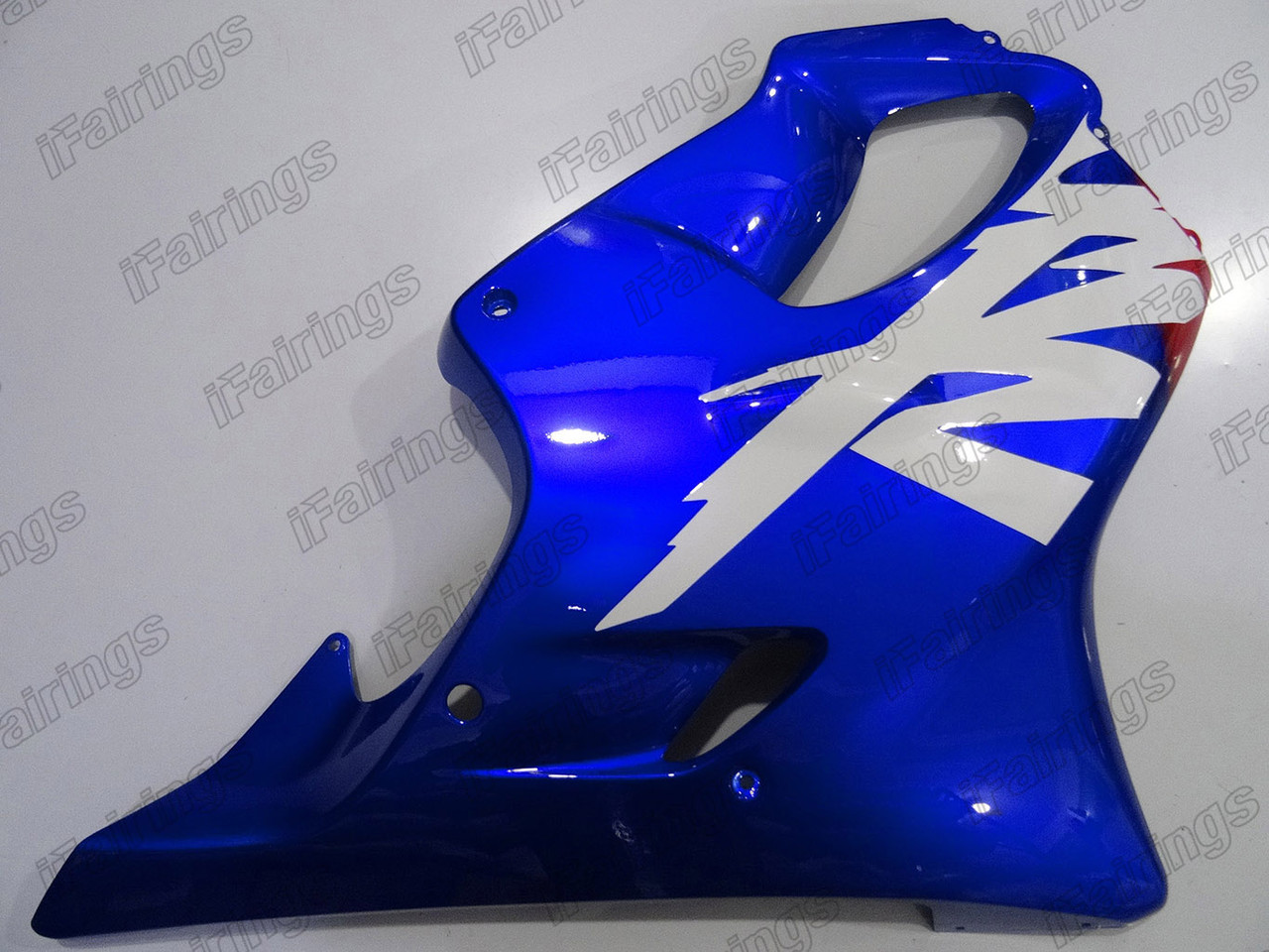 Aftermarket fairing for 1999 2000 Honda CBR600F4 red and blue livery.