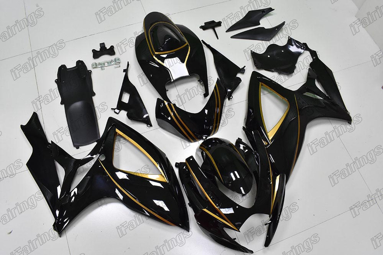 Aftermarket fairing for 2006 2007 Suzuki GSXR 600/750 gloss black with gold  stripes.