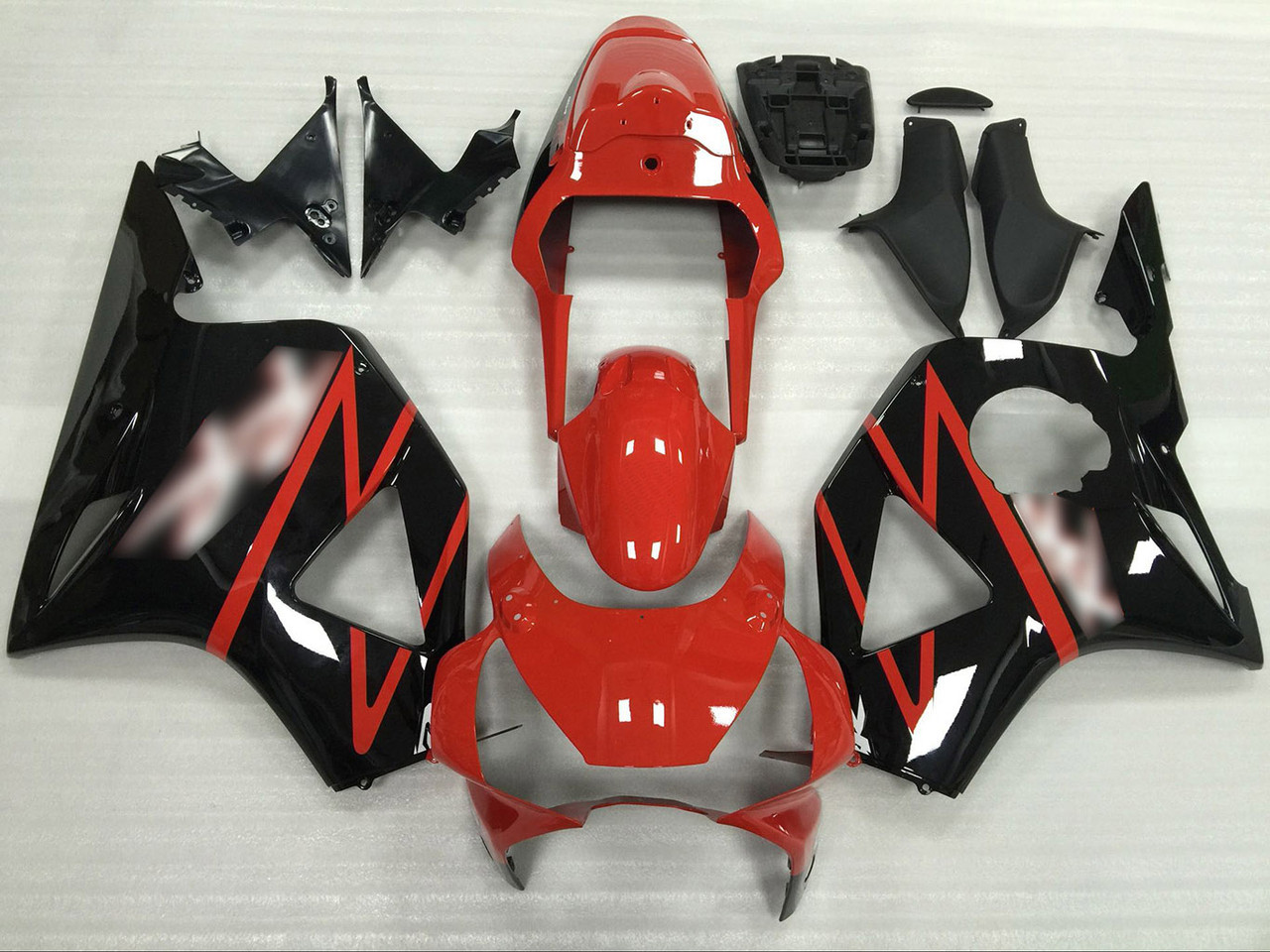 Aftermarket fairing for 2002 2003 Honda CBR900RR CBR954RR red and black.