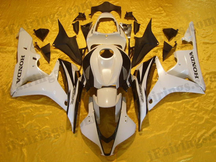 Honda CBR600RR 2009 2010 2011 white and black fairing kits, this Honda CBR600RR 2009 2010 2011 plastics was applied in honda limited editiongraphics, this 2009 2010 2011 CBR600RR fairing set comes with the both color and decals shown as the photo.If you want to do custom fairings for CBR600RR 2009 2010 2011,our talented airbrusher will custom it for you.