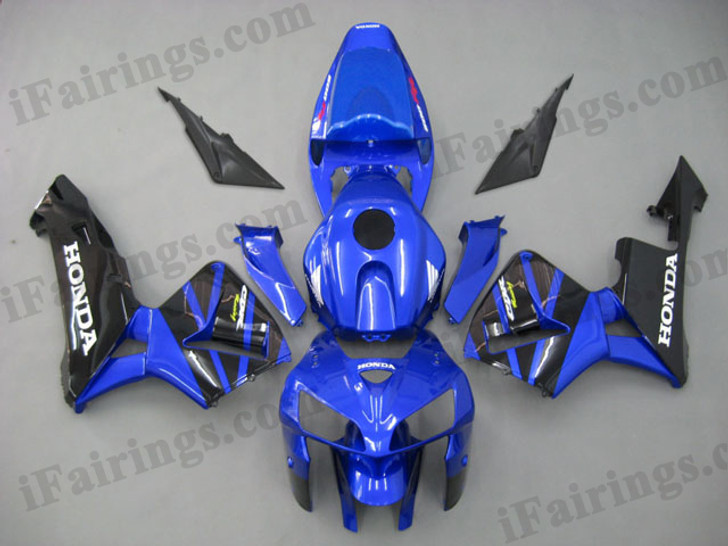 Honda CBR600RR 2005 2006 candy blue and blackfairing kits, this Honda CBR600RR 2005 2006 plastics was applied in candy blue and blackgraphics, this 2005 2006 CBR600RR fairing set comes with the both color and decals shown as the photo.If you want to do custom fairings for CBR600RR 2005 2006,our talented airbrusher will custom it for you.