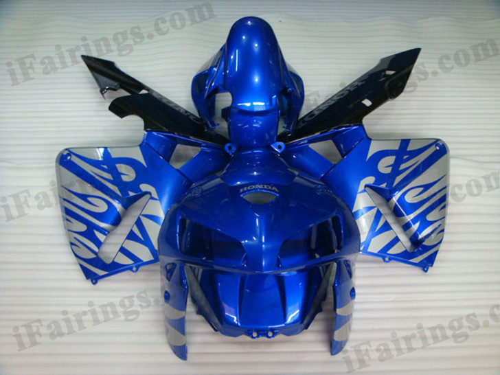 Honda CBR600RR 2005 2006 blue and flamefairing kits, this Honda CBR600RR 2005 2006 plastics was applied in blue and flamegraphics, this 2005 2006 CBR600RR fairing set comes with the both color and decals shown as the photo.If you want to do custom fairings for CBR600RR 2005 2006,our talented airbrusher will custom it for you