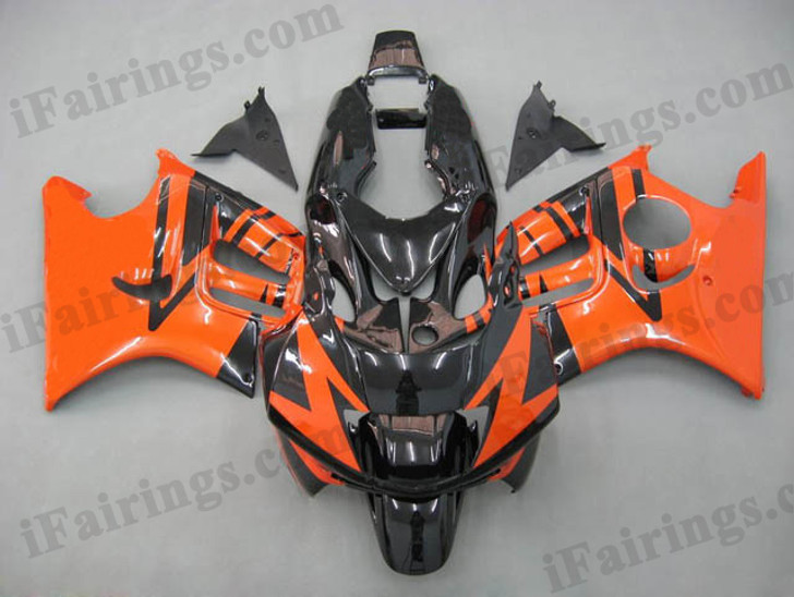 Honda CBR600 F3 1995 1996 orange/black fairing kits, 1995 1996 Honda CBR600 F3 orange/black plastic.This Honda CBR600 F3 1995 1996 fairing kits was applied in orange/black graphics, this 1995 1996 CBR600 fairing set comes with the both color and decals shown as the photo.If you want to do custom fairings for CBR600 F3 1995 1996,our talented airbrusher will custom it for you