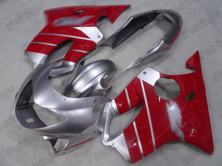 Aftermarket fairing for 1999 2000 Honda CBR600F4 silver and red livery.