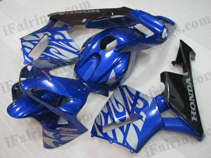 Honda CBR600RR 2003 2004 candy blue and black fairing kits, this Honda CBR600RR 2003 2004 plastics was applied in candy blue and black graphics, this 2003 2004 CBR600RR fairing set comes with the both color and decals shown as the photo.If you want to do custom fairings for CBR600RR 2003 2004,our talented airbrusher will custom it for you