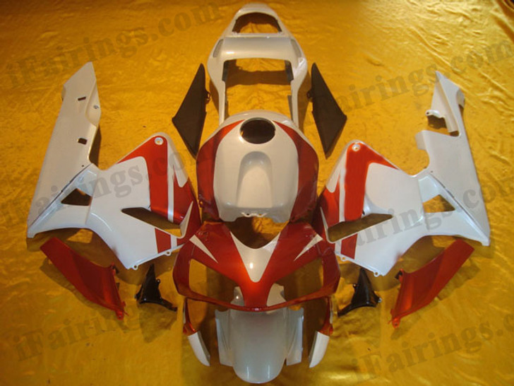 Quality aftermarket fairing kits for 2003 2004 Honda CBR600RR with orange and black color scheme/graphics. These body kits are 2003 2004 Honda CBR600RR replacement bodywork, they are oem quality, fast shipping and easy installation.