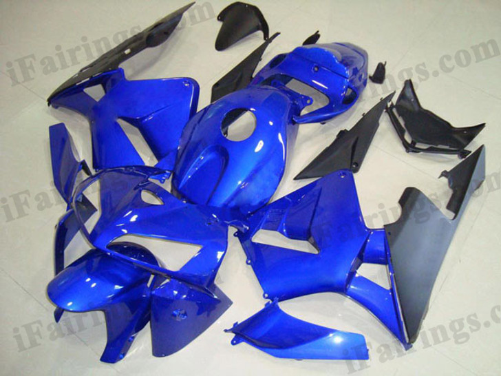 Honda CBR600RR 2005 2006 candy blue and blackfairing kits, this Honda CBR600RR 2005 2006 plastics was applied in candy blue and blackgraphics, this 2005 2006 CBR600RR fairing set comes with the both color and decals shown as the photo.If you want to do custom fairings for CBR600RR 2005 2006,our talented airbrusher will custom it for you.