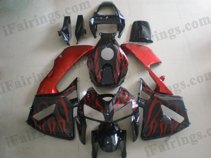 Honda CBR600RR 2005 2006 black/red flame fairing kits, this Honda CBR600RR 2005 2006 plastics was applied in black/red flamegraphics, this 2005 2006 CBR600RR fairing set comes with the both color and decals shown as the photo.If you want to do custom fairings for CBR600RR 2005 2006,our talented airbrusher will custom it for you.