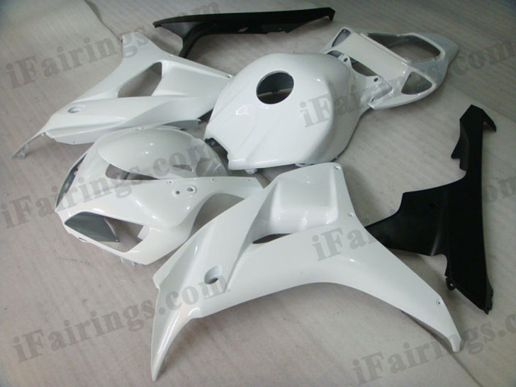 OEM quality fairings and body kits for 2006 2007 Honda CBR1000RR with white and black color scheme/graphics, these fairing kits are oem quality, fast shipping and easy installtion. More factory color-matched fairings for CBR1000RR 2006 2007, team race replica fairings and custom fairing sets for Honda CBR1000RR 2006 2007, please browse iFairings.com.