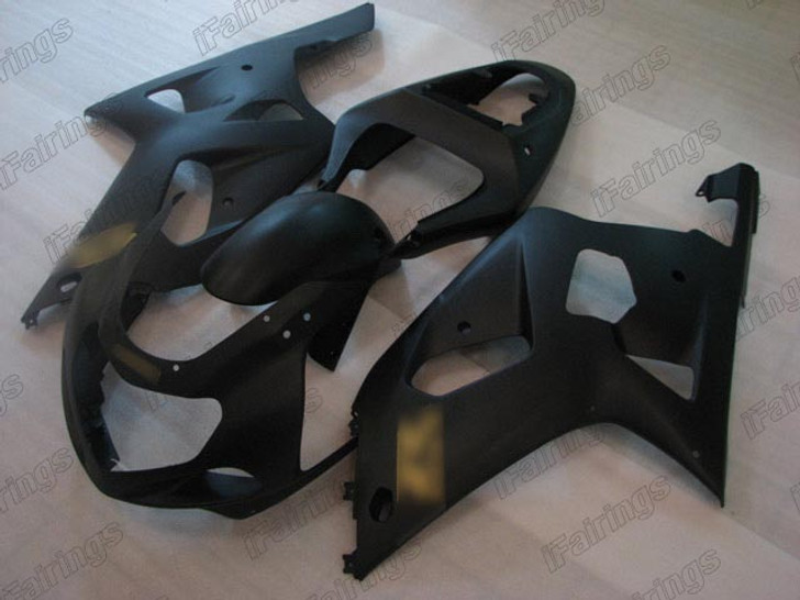 Aftermarket fairing for 2001 2002 2003 Suzuki GSXR 600/750 matte black with gold stickers.