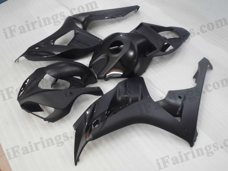 Honda CBR1000RR 2006 2007 glossy black fairing kits, this Honda CBR1000RR 2006 2007 plastics was applied in glossy blackgraphics, this 2006 2007 CBR1000RR fairing set comes with the both color and decals shown as the photo.If you want to do custom fairings for CBR1000RR 2006 2007,our talented airbrusher will custom it for you.