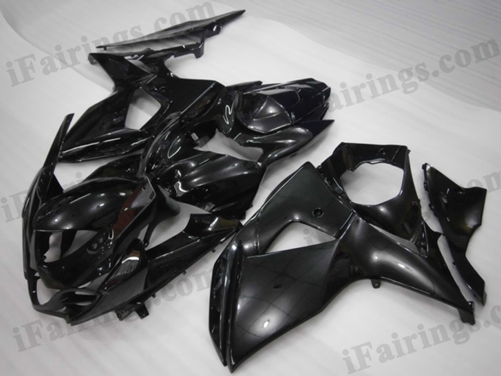 OEM quality fairings and body kits for 2009 2010 2011 2012 Suzuki GSXR1000 with glossy black color scheme/graphics, these fairing kits are oem quality, fast shipping and easy installtion. More factory color-matched fairings for GSXR1000 2009 2010 2011 2012, team race replica fairings and custom fairing sets for Suzuki GSXR1000 2009 2010 2011 2012, please browse iFairings.com.