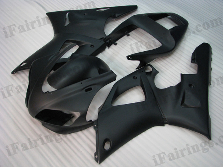 OEM quality fairings and body kits for 1998 1999 Yamaha YZF-R1 with matt black color scheme/graphics, these fairing kits are oem quality, fast shipping and easy installtion. More factory color-matched fairings for YZF-R1 1998 1999, team race replica fairings and custom fairing sets for Yamaha YZF-R1 1998 1999, please browse iFairings.com.