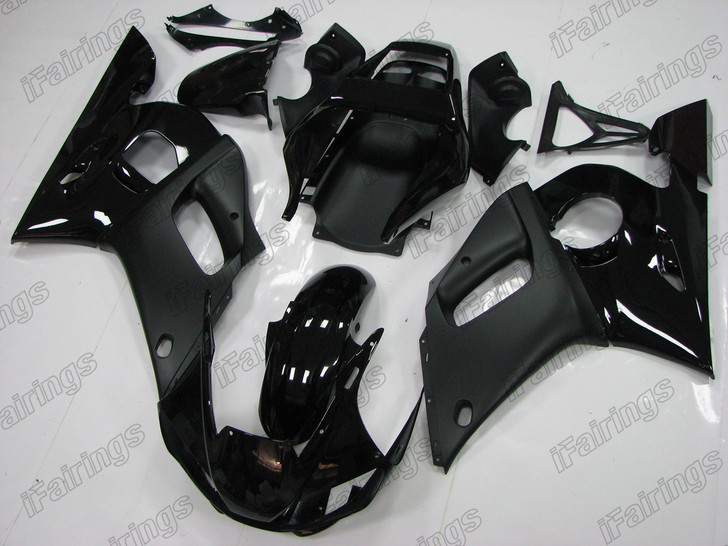 Aftermarket fairing for 1999 2000 2001 2002 Yamaha YZF-R6 gloss black and matte black with no stickers.