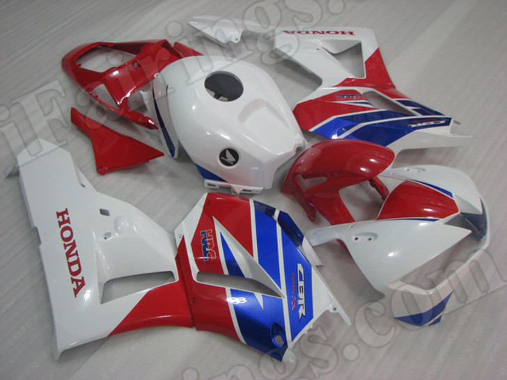 OEM quality replacement fairing sets for Honda CBR600RR 2013 2014 with factory color scheme red, blue and white.  The fairings are injection molds made and 100% precisely fit Honda Factory bike. All Honda sponsors decals/stickers are applied on the fairings. Custom painting job is acceptable.