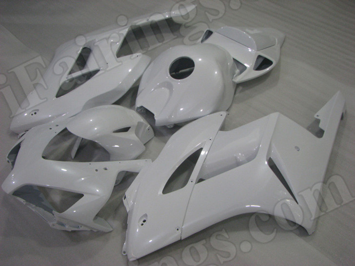 aftermarket fairings and bodywork for Honda CBR1000RR 2004 2005, this motorcycle fairings are replacement plastic with various graphics,  they are top quality and oem fairing quality comparable. All the bodywork panels are pre-drilled and 100% precise fit factory bike.
