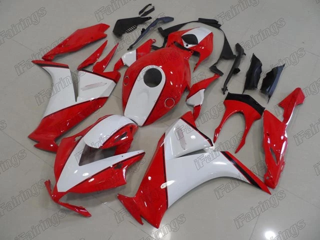 Aftermarket fairing for Honda CBR1000RR 2012 to 2016 in red and white color.