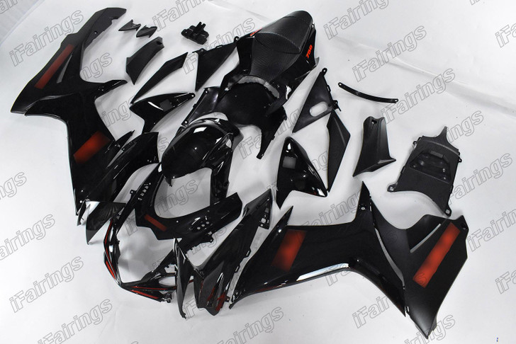 Aftermarket fairing for 2011 to 2025 Suzuki GSX-R600 GSX-R750 black color red decals.