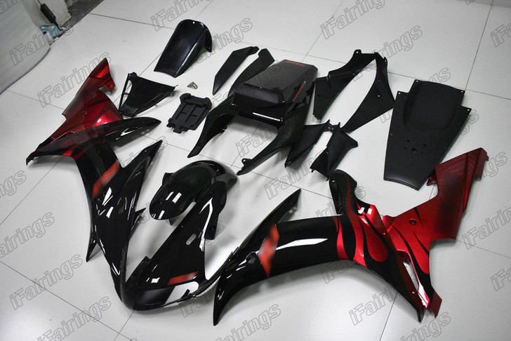 Aftermarket fairing for 2002 2003 Yamaha YZF-R1 black and red.