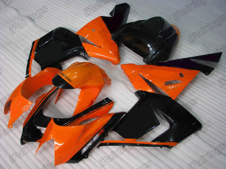 Aftermarket fairing for 2004 2005 Kawasaki Ninja ZX-10R orange and black scheme.