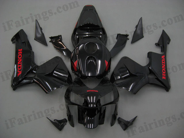 Honda CBR600RR 2003 2004 glossy black fairing kits, this Honda CBR600RR 2003 2004 plastics was applied in glossy black graphics, this 2003 2004 CBR600RR fairing set comes with the both color and decals shown as the photo.If you want to do custom fairings for CBR600RR 2003 2004,our talented airbrusher will custom it for you.