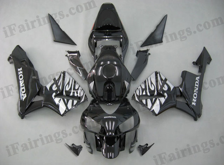 Honda CBR600RR 2003 2004 black and silver flame fairing kits, this Honda CBR600RR 2003 2004 plastics was applied in black and silver flame graphics, this 2003 2004 CBR600RR fairing set comes with the both color and decals shown as the photo.If you want to do custom fairings for CBR600RR 2003 2004,our talented airbrusher will custom it for you
