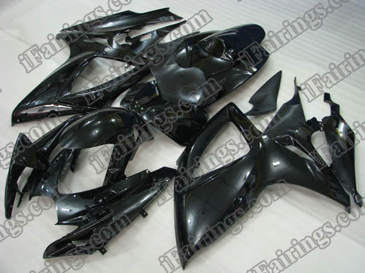 Suzuki GSXR600/750 2006 2007 glossy black fairing kits, this Suzuki GSXR600/750 2006 2007 plastics was applied in glossy black graphics, this 2006 2007 GSXR600/750 fairing set comes with the both color and decals shown as the photo.If you want to do custom fairings for GSXR600/750 2006 2007,our talented airbrusher will custom it for you.