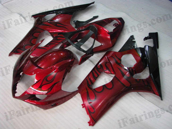 Suzuki GSXR1000 2003 2004 red and black flame fairing kits, this Suzuki GSXR1000 2003 2004 plastics was applied in red and black flame graphics, this 2003 2004 GSXR1000 fairing set comes with the both color and decals shown as the photo.If you want to do custom fairings for GSXR1000 2003 2004,our talented airbrusher will custom it for you.