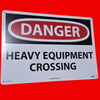 The National Marker Company (NMC) D471AC "Danger - Heavy Equipment Crossing" 14"W x 20"Lx .040" Thick Aluminum Safety Sign