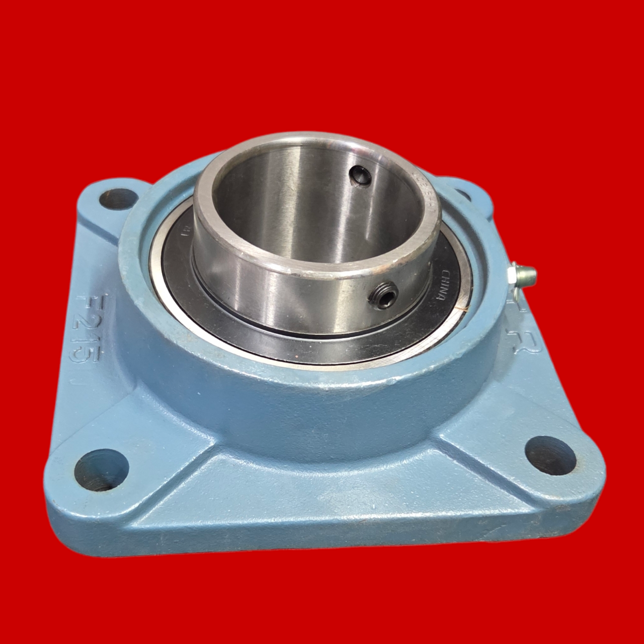 Tritan UC215-47 Four Bolt Flange Bearing: Radial Ball, 2 15/16 in Bore, Cast Iron, Set Screws, 7 7/8 in Lg