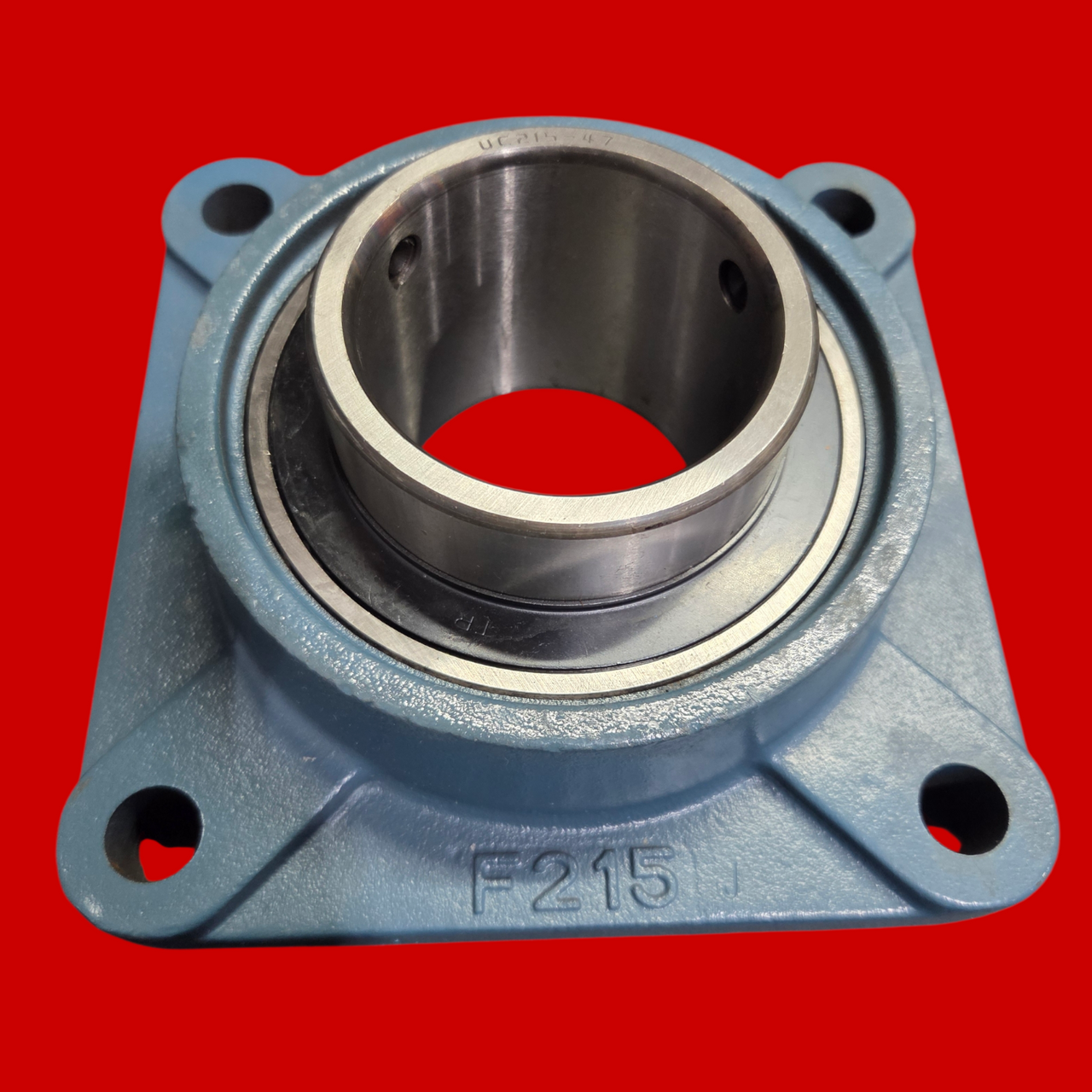 Tritan UC215-47 Four Bolt Flange Bearing: Radial Ball, 2 15/16 in Bore, Cast Iron, Set Screws, 7 7/8 in Lg