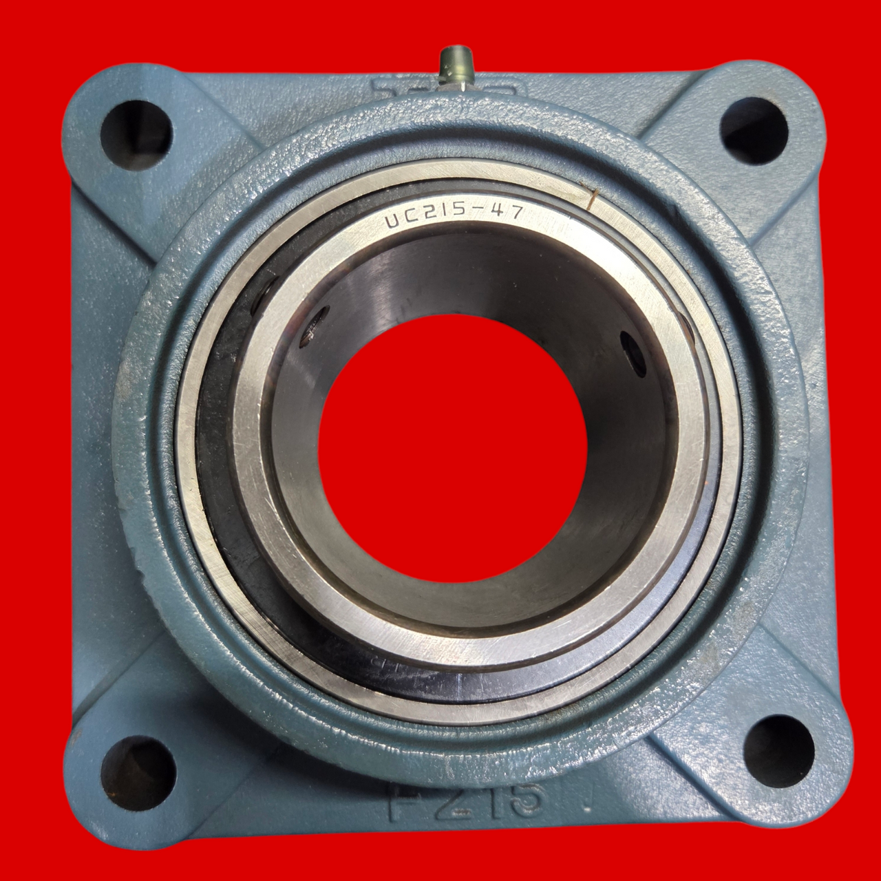 Tritan UC215-47 Four Bolt Flange Bearing: Radial Ball, 2 15/16 in Bore, Cast Iron, Set Screws, 7 7/8 in Lg