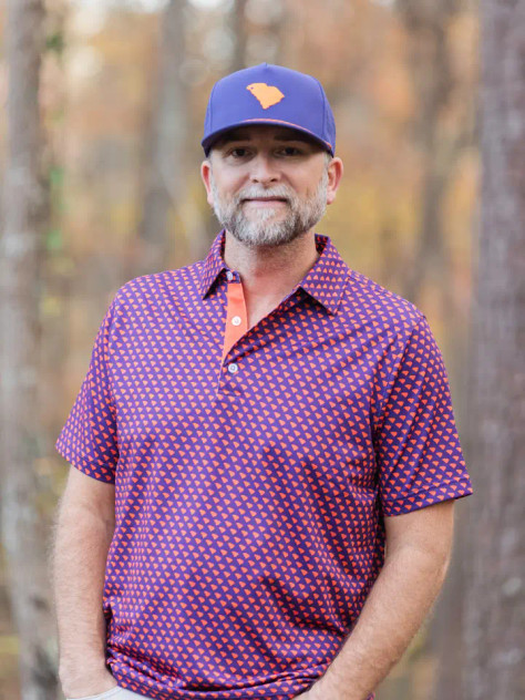 Happy By Rachel Orange & Purple State Performance Polo Happy By Rachel Orange & Purple State Performance Polo