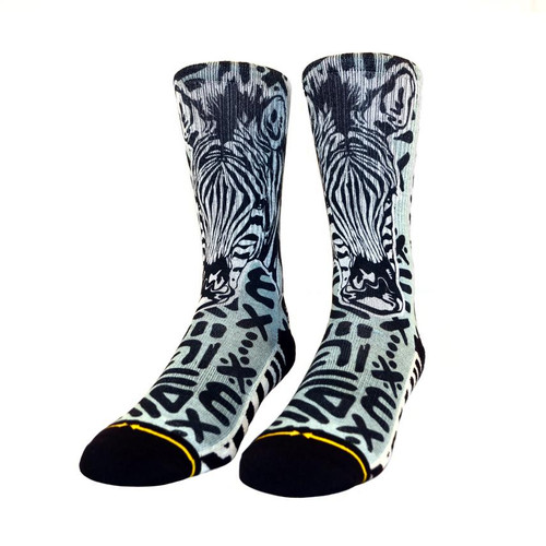 What's black and white and rad all over? These epic zebra crew socks from MERGE4's collaboration with artist, Taylor Reinhold. Built with elastic arch support and breathable, stretchy fabric, these performance socks will put some extra 'pep' in your step for your everyday adventures.

Between October 1, 2019 and September 30, 2021, MERGE4 will donate 7% of the gross sales from each pair of these socks directly to the San Diego Zoo Global Wildlife Conservancy and their conservation efforts around the world – thank you for your support!