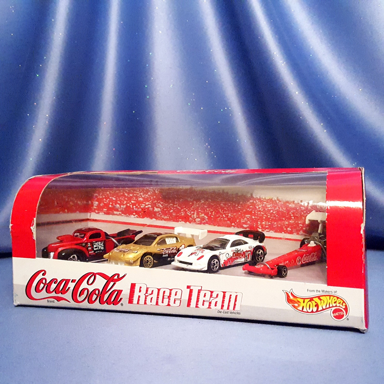 Coca-Cola Race Team 4 Piece Car Collection by Hot Wheels. - Now
