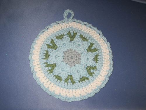 Round Flower Potholder-Trivet in Blue, Grey and Green Crocheted by Mumsie of Stratford.