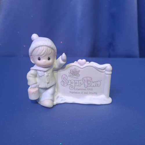 Precious Moments Sugar Town "Sam Butcher Painting Sign" Figure by Enesco (1992).