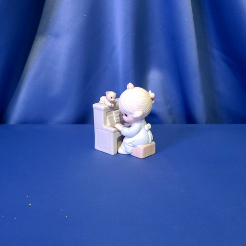 Precious Moments "Lord, Keep My Life in Tune" Figurine by Enesco.