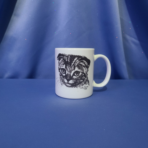 Cat on Mug by Porcelain by Rosalinde. Cat on Mug by Porcelain by Rosalinde.