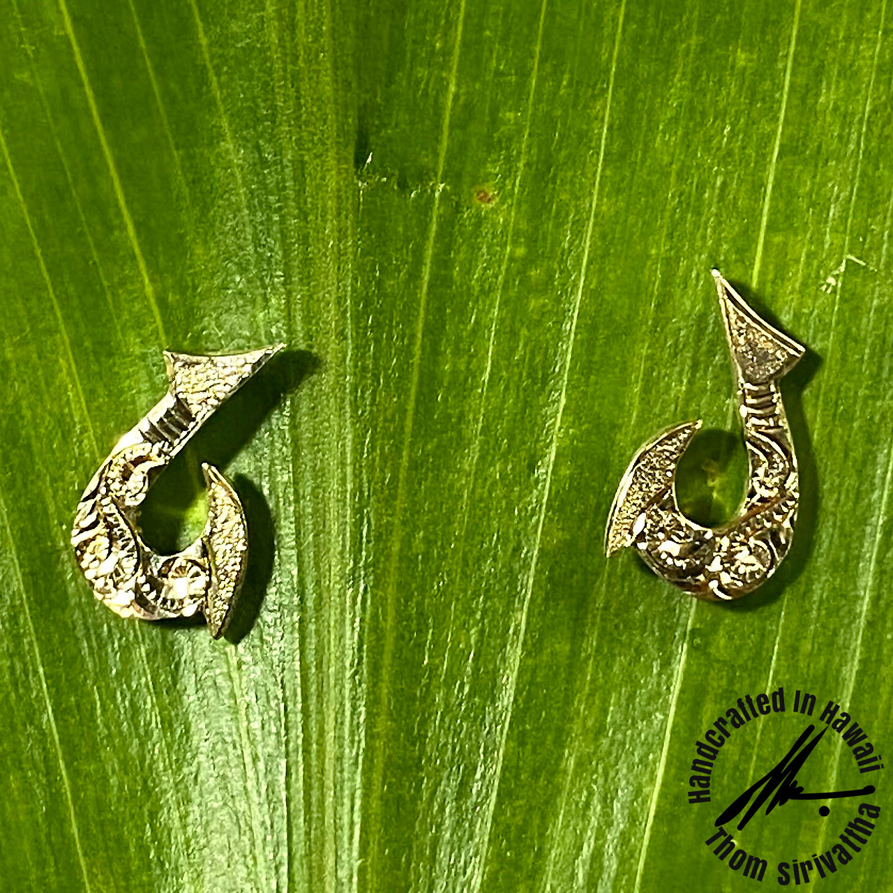 https://cdn11.bigcommerce.com/s-u35g44c/images/stencil/1280x1280/products/533/2649/14K_Fishhook_Stud_Earrings_Hand_Engraved_with_Peincess_Scroll_Design_WM2__92455.1635436865.jpg?c=2