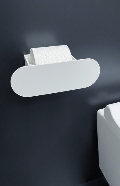 Sleek ROUND MA006A white toilet paper holder, enhancing the bathroom's modern aesthetic with its smooth curves and striking