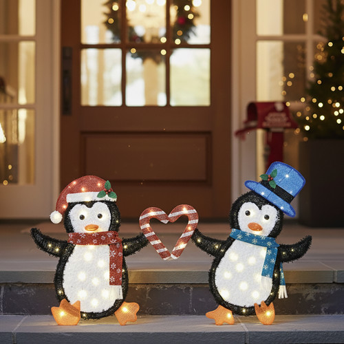 Holiday Time Set of 2 Light-Up Penguin Couple with Heart-Shaped Candy Cane Family Christmas Decoration