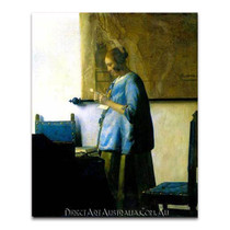 Jan Vermeer | Woman in Blue Reading a Letter 