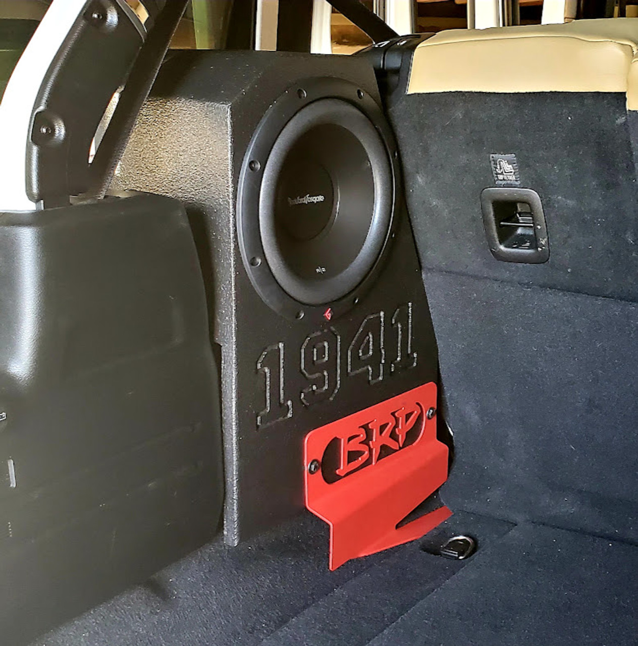 2018 And Newer (Driver) Jeep Wrangler JLU 10 inch Rhino Coated Subwoofer Boxes Sealed. BRP driver bracket. One Rockford Fosgate R2D2 ten inch subwoofer.