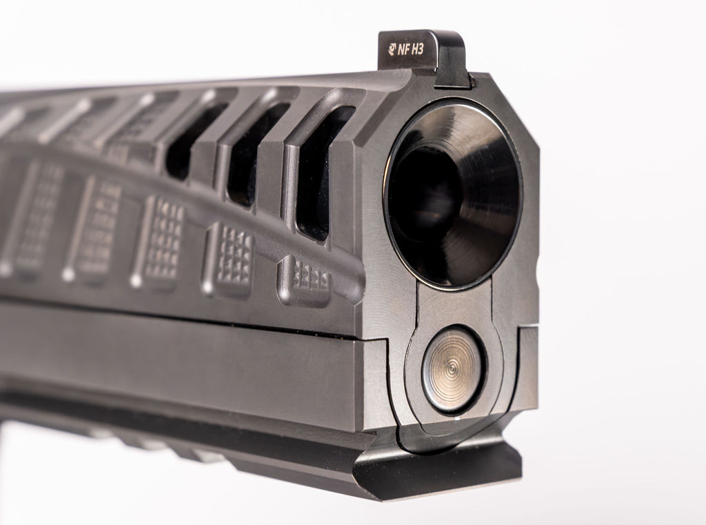 Front of the Torch Tactical showing the bull barrel crown at the muzzle and the squared strike face beneath it.