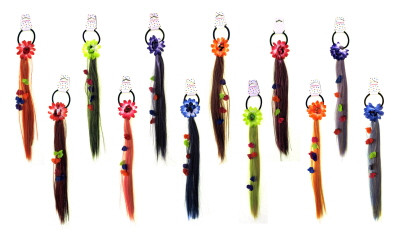 Hair scrunchie with a flower attached and synthetic hair in vibrant colors hanging with small flowers within the hair strands HH2525