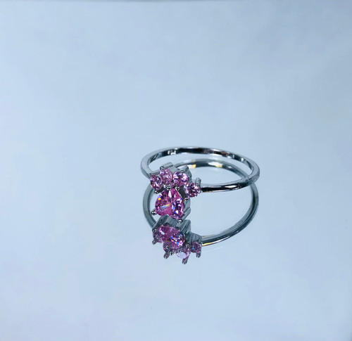 Silver paw ring with pink gemstone