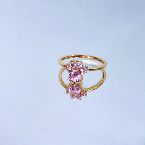 Gold paw ring with pink gemstone